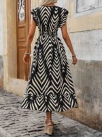 Rochie Lunga Nervisa Neagra cu Print Bej - imagine 2