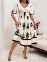 Rochie Midi Phelina Crem cu Print Negru
